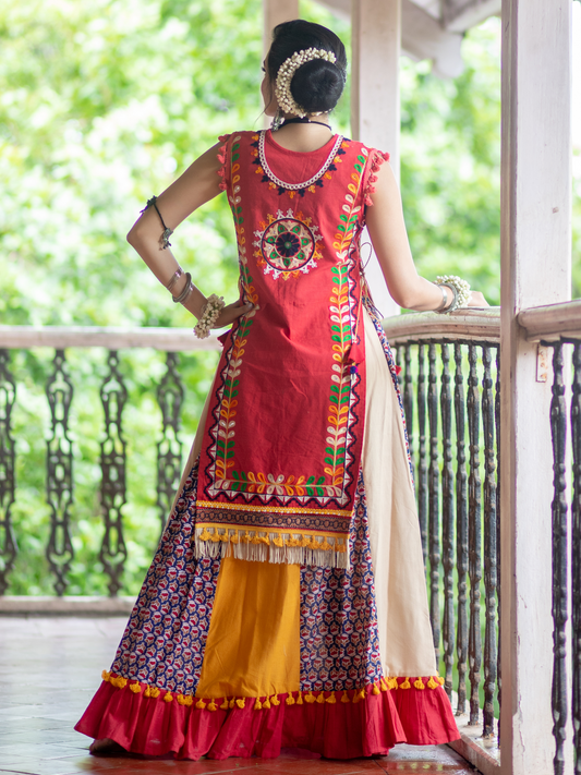 Red circular traditional embroidered panel top paired with multi color flairy skirt